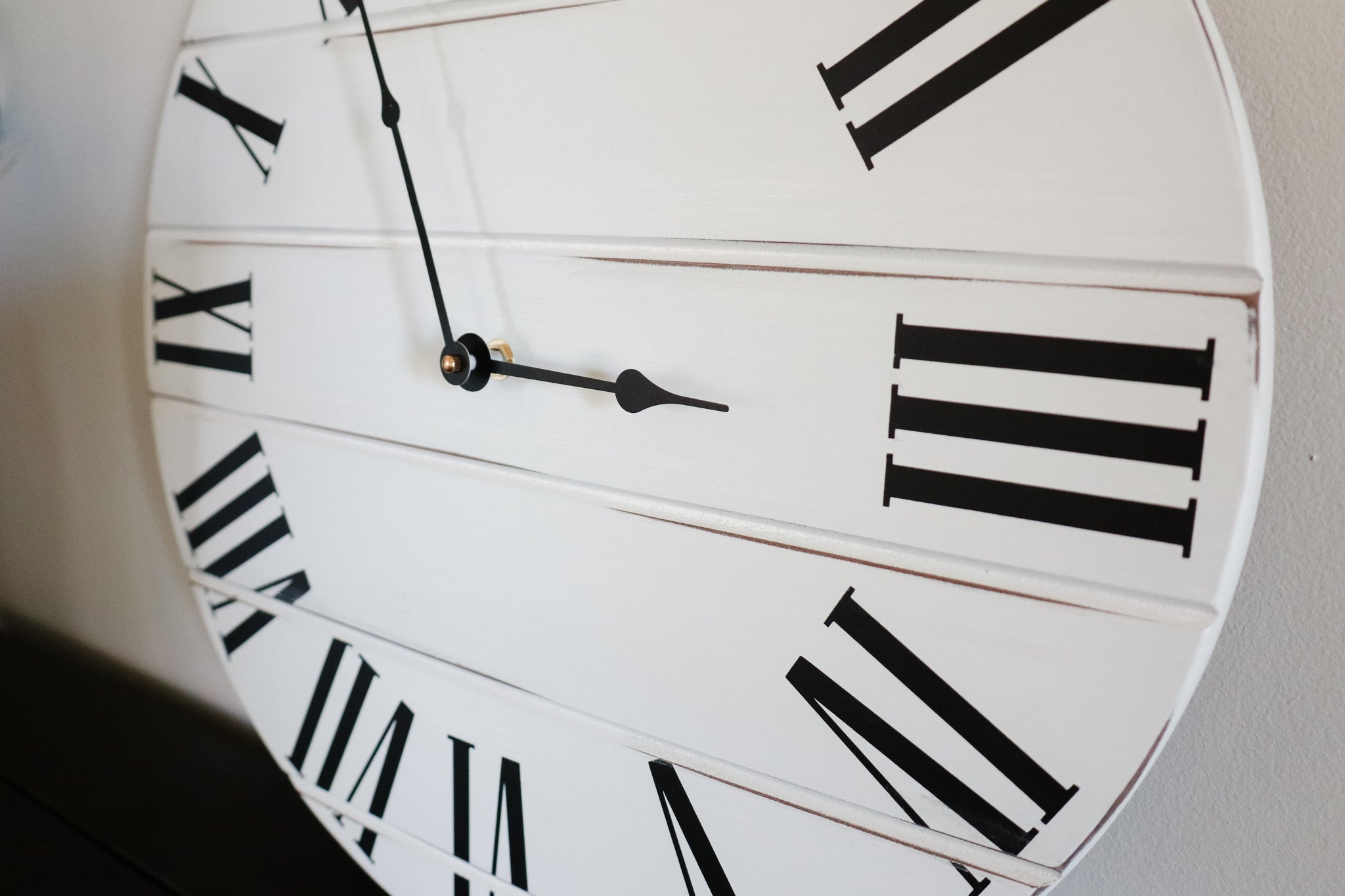 Simple White Lightly Distressed Large Wall Clock with Black Roman Numerals