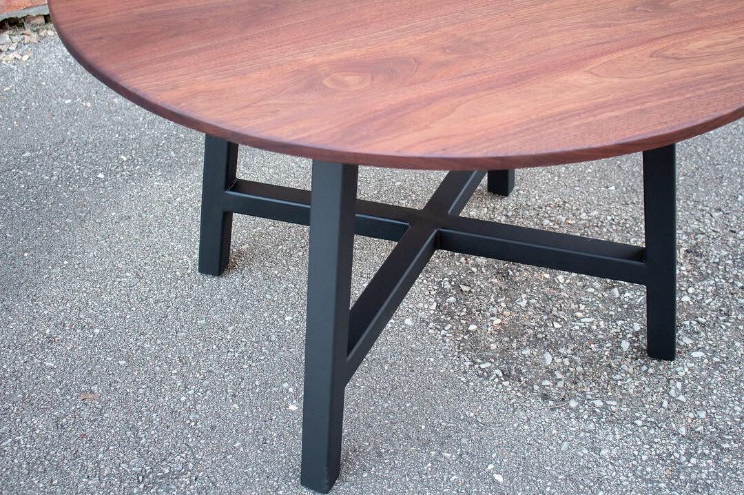 Modern Round Walnut Dining Table with Black Steel Legs