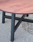 Modern Round Walnut Dining Table with Black Steel Legs