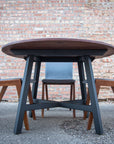 Modern Round Walnut Dining Table with Black Steel Legs