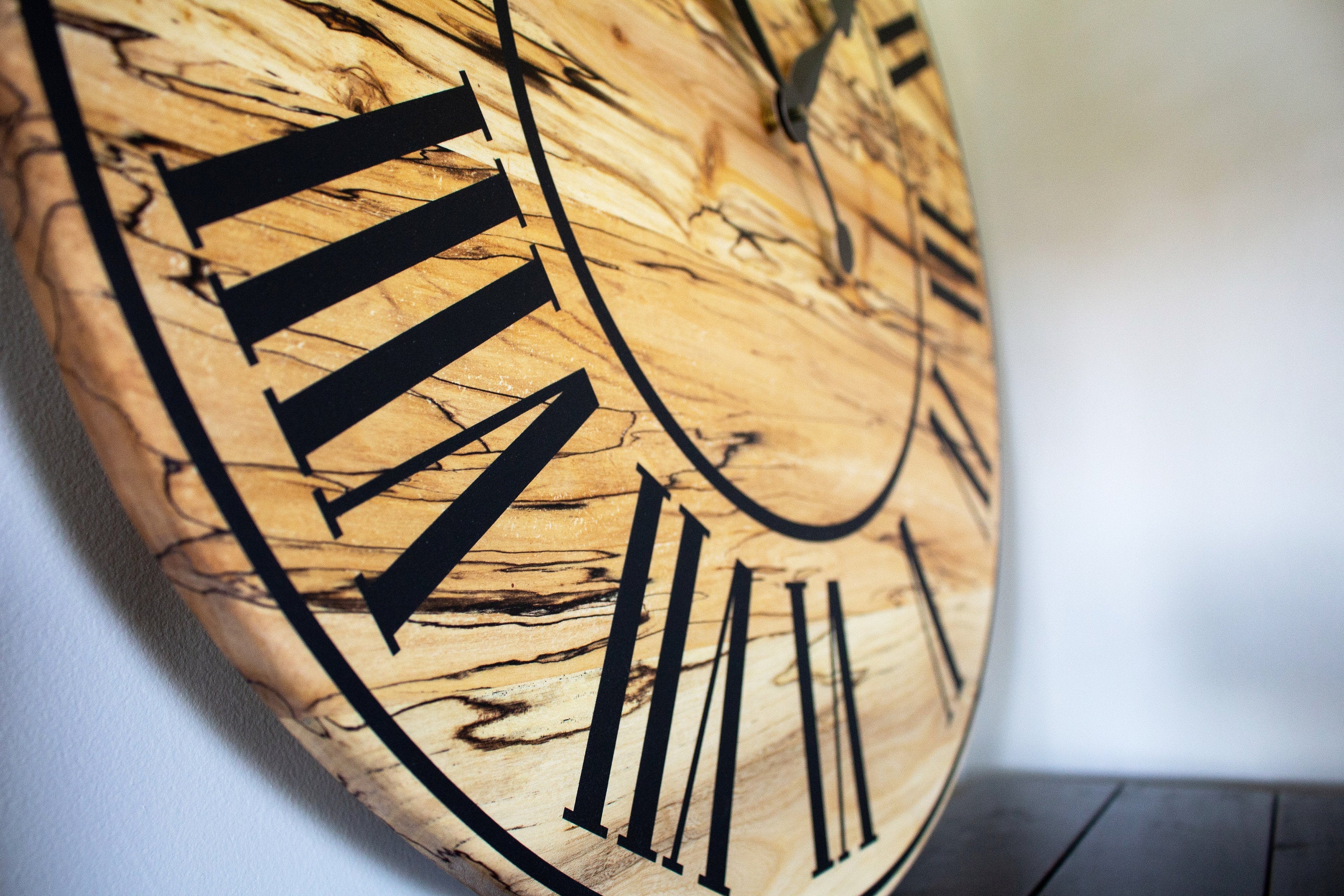 Solid Spalted Maple Wall Clock with Black Lines and Roman Numerals